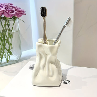 A Creamy Wind-bound Mouthwash Toothbrush Holder